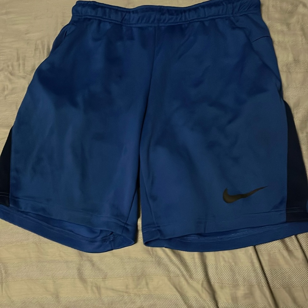 Blue Nike athletic shorts